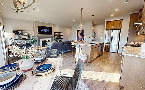 A Well-Designed Kitchen and Dining Area by Jagoe Homes in Cumberland