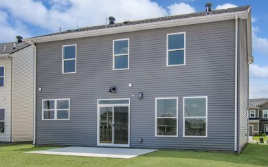Rear Exterior Rear exterior of the Cumberland Farmhouse floor plan by Jagoe Homes