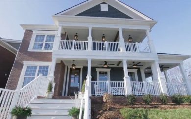 Pinot Elevation A | 4200 | Owensboro, KY A two-story home with a welcoming porch, located in Owensboro, KY, with classic architecture