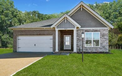 Front exterior of the Arizona Craftsman floor plan by Jagoe Homes, showcasing its architectural design and curb appeal.