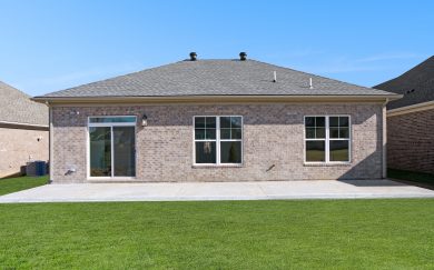 Outdoor retreat with a large patio in the Arizona Craftsman floor plan by Jagoe Homes, perfect for relaxation and entertaining.