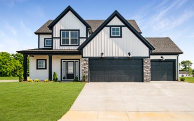 National-Modern-with-3-car-garage-4 Head-on exterior view of the national farmhouse floorplan